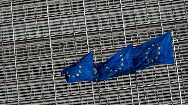 European Union flags flutter outside the EU Commission headquarters in Brussels, Belgium, March 12, 2018. REUTERS/Yves Herman