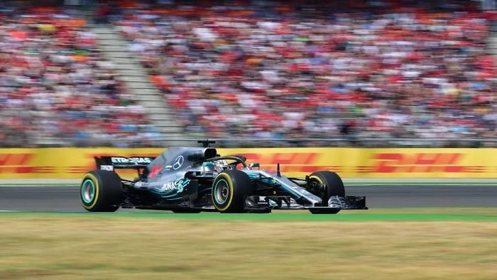 Lewis Hamilton memenangi GP Jerman 2018. (Foto: Andrej Isakovic/AFP Photo) Lewis Hamilton memenangi GP Jerman 2018. (Foto: Andrej Isakovic/AFP Photo)