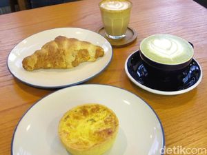 Simetri: Nyantai Sore Ditemani Cappuccino dan Quiche Daging Keju di Kafe Cozy