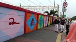Foto: Warna-warni Mural Asian Games Pasukan Oranye di Jatinegara