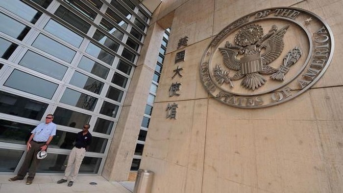 The US Embassy in Beijing has heavy security measures, including a bulletproof glass wall (file photo) (Image: AFP)