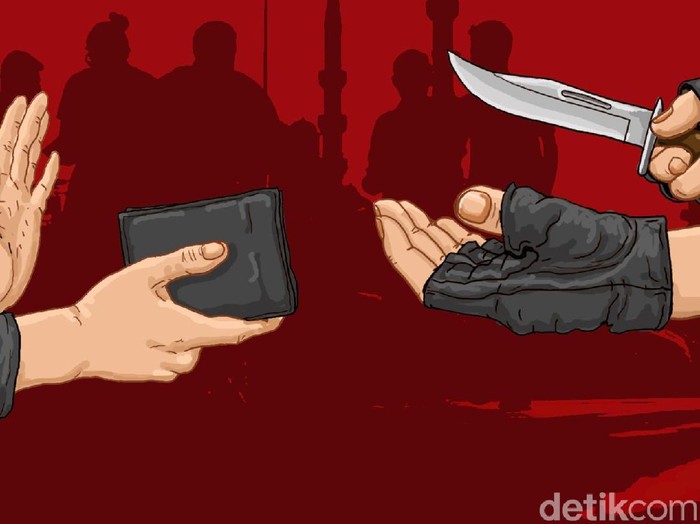 pejalan kaki diminta dompetnya dengan menodongkan pisau