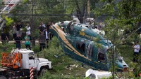 Beijing Youth Daily melaporkan, helikopter jatuh di Desa Naidong di dekat Jingcheng.  (Foto: Dok. REUTERS/Thomas Peter)
