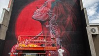 Meningkatnya minat dan perhatian masyarakat pada seni grafiti menjadi dasar dari lahirnya sebuah festival bernama Upfest. Festival yang diselenggarakan di kota Bristol, Inggris ini menjadi festival grafiti terbesar di Eropa. Matt Cardy/Getty Images.