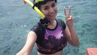 Habis snorkeling di Bunaken, Sulawesi Utara, girang banget sih! (fera_fe/Instagram)