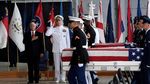 Potret 55 Peti Jasad Tentara AS dari Korut Saat Tiba di Pearl Harbor