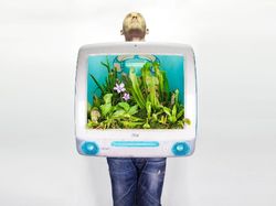 Keren! Pria Ini Ubah Komputer Apple Bekas Jadi Pot Tanaman