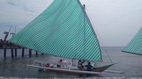 Foto: Untuk lomba sampan layar tradisional titik startnya dimulai dari Pulau Sangiang kemudian finish di Desa Sangiang, kurang lebih 12 kilometer melewati ganasnya Laut Flores. (Ayang Saifullah/istimewa)