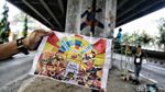 73 Seniman Dikerahkan untuk Beautifikasi Mural Tiang Tol Rawamangun