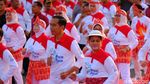 Potret Asyiknya Jokowi-JK Saat Senam Poco-poco di Monas
