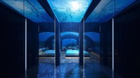 Lalu sebuah tangga spiral turun ke bawah permukaan laut di dasar laut, ada kamar tidur berukuran besar, ruang tamu dan kamar mandi. Dengan langit-langit berbentuk kubah akrilik yang jernih dan melengkung, dan dinding serba kaca, suite ini memiliki ruangan 180 derajat, pemandangan yang mencakup semua kehidupan laut di sekitarnya. Istimewa/Conrad Hotels & Resorts.