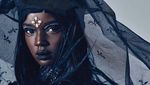Duckie Thot Model Berkulit Gelap yang Mempesona