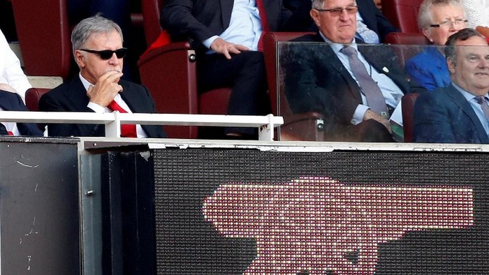 FILE PHOTO: Arsenal owner Stan Kroenke looks on from the stands during their match against Burnley at the Emirates Stadium in London, Britain, May 6, 2018. REUTERS/Matthew Childs/File Photo EDITORIAL USE ONLY. No use with unauthorized audio, video, data, fixture lists, club/league logos or live services. Online in-match use limited to 75 images, no video emulation. No use in betting, games or single club/league/player publications.  Please contact your account representative for further details.