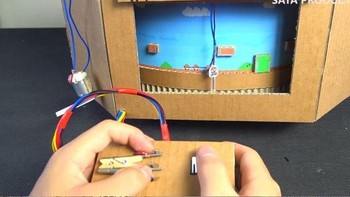 Kanal YouTube Sata Productions membuat game Super Mario Bros menggunakan kardus. Bahkan semua karakter dan latar belakang game-nya terbuat dari kardus. (Foto: geek.com)