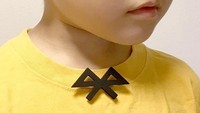 Kayaknya ini sedikit maksa, logo Bluetooth dijadikan dasi kupu-kupu. Istimewa/www.oodesign.jp.