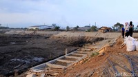 Penampakan terkini pembangunan kolam retensi di Kampung Cieunteung, Baleendah, Kabupaten Bandung, Jumat (10/8/2018).