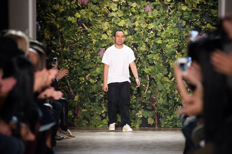 prabowo dan didit hediprasetyo PARIS, FRANCE - JANUARY 23: Designer Didit Hediprasetyo acknowledges the applause of the audience after his show as part of Paris Fashion Week Haute Couture Spring/Summer 2014 on January 23, 2014 in Paris, France. (Photo by Francois Durand/Getty Images)