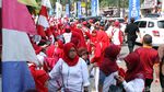 Foto: Anak Sekolah Ibu Kota Ramaikan Pawai Obor Asian Games