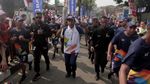 Potret Meriahnya Arak-arakan Obor Asian Games di Jakarta