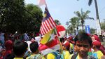 Foto: Anak Sekolah Ibu Kota Ramaikan Pawai Obor Asian Games