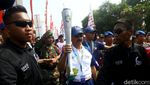 Potret Meriahnya Arak-arakan Obor Asian Games di Jakarta
