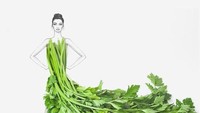 Ilustrasi seorang wanita menggunakan gaun dari daun seledri.