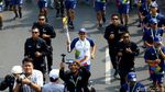 Potret Meriahnya Arak-arakan Obor Asian Games di Jakarta