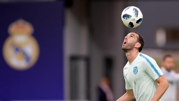 Diego Godin (Atletico Madrid/Uruguay) dengan rating 90. (Foto: Alexander Hassenstein/Getty Images)