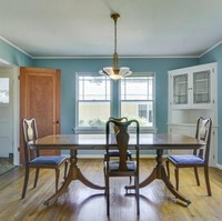 Area ruang makan yang sudah dilengkapi furnitur berupa meja dan kursi makan. Foto: Dok. Sothebys International Realty