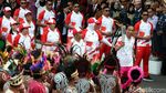 Ekspresi Jokowi Saat Api Obor Asian Games yang Dibawa Mati