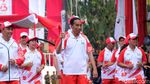Ekspresi Jokowi Saat Api Obor Asian Games yang Dibawa Mati