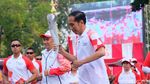 Ekspresi Jokowi Saat Api Obor Asian Games yang Dibawa Mati