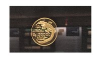 BI juga menerbitkan uang logam dengan pecahan Rp 100.000. Bahan yang digunakan adalah emas seberat 33,437 gram. Bagian depan lambang Garuda Pancasila dan bagian belakang gambar Komodo. Istimewa/Dok. Bank Indonesia.