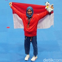 Dari sekian banyak peraih medali emas, beberapa di antaranya adalah atlet berhijab. Sebut saja Defia Rosmaniar dari cabang olahraga Taekwondo hingga Aries Susanti dari cabang olahraga panjat tebing. Foto: Grandyos Zafna