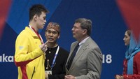 Sun Yang sempat protes saat bendera jatuh. Dia meminta lagu kebangsaan China dinyanyikan ulang (Foto: INASGOC/Rosa Panggabean/Spt/18.)