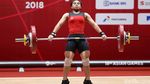 Sri Wahyuni Persembahkan Perak Angkat Besi Putri