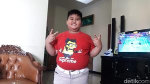 Foto: Fairel, Anak Pramuka yang Melongo Lihat Jokowi Naik Moge