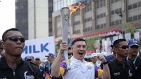 PT Indofood Sukses Makmur Tbk menyatakan partisipasinya dalam pawai obor atau Torch Relay Asian Games 2018. Foto: dok. INASGOC