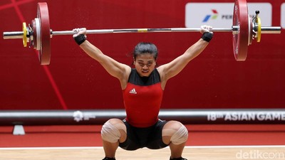 Sri Wahyuni Persembahkan Perak Angkat Besi Putri