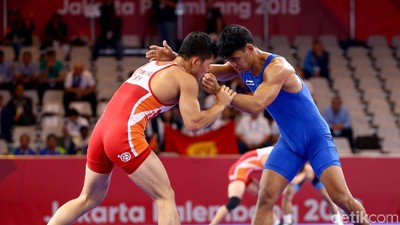 Mantap! Pegulat Indonesia Muhammad Aliansyah Melaju ke Perempatfinal