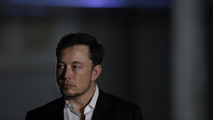 Elon Musk founder, CEO, and chief engineer/designer of SpaceX speaks during a news conference after a Falcon 9 SpaceX rocket test flight to demonstrate the capsules emergency escape system at the Kennedy Space Center in Cape Canaveral, Fla., Sunday, Jan. 19, 2020. (AP Photo/John Raoux)