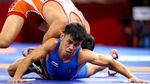 Mantap! Pegulat Indonesia Muhammad Aliansyah Melaju ke Perempatfinal