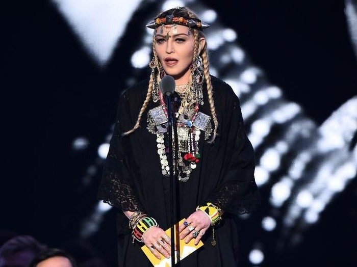 NEW YORK, NY - AUGUST 20:  Madonna speaks onstage during the 2018 MTV Video Music Awards at Radio City Music Hall on August 20, 2018 in New York City.  (Photo by Michael Loccisano/Getty Images for MTV)