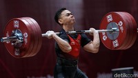 Bertanding di Hall A, JIExpo, Jakarta, Selasa (21/8/2018) siang WIB, Eko mengawali dengan baik saat membukukan angkatan snatch 141 kg.