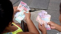 Mata uang baru ini memangkas lima angka 0 di belakang mata uang lama. Jadi 1 juta bolivar kini menjadi hanya 10 bolivar.
