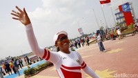 Ekspresi kebahagiaan tim dayung Indonesia usai meraih medali.