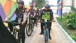 Melihat Polisi Berpatroli Naik Sepeda di Wisma Atlet Asian Games