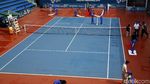 Aksi Mengeringkan Lapangan Tenis dengan Handuk
