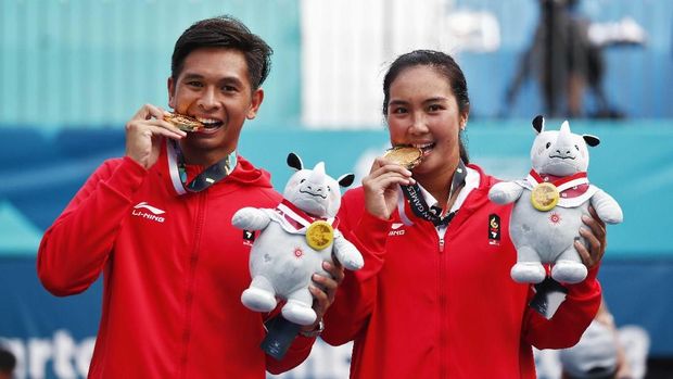 Christopher Rungkat/Aldila Sutjiadi mampu membuat kejutan dengan meraih emas nomor ganda campuran.