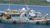 Baru-baru ini Menteri Kelautan dan Perikanan Susi Pudjiastuti kembali menenggelamkan 125 kapal secara serentak di 11 lokasi di seluruh Indonesia.Foto: Dok. Kementerian Kelautan dan Perikanan.